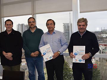 Baldo con Irigoin y los organizadores del encuentro